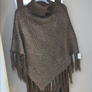 Poncho with tassels